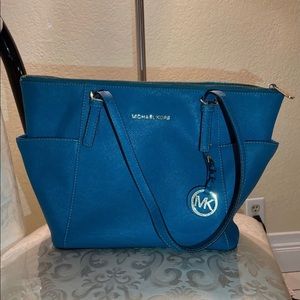 Teal Michael Kors purse